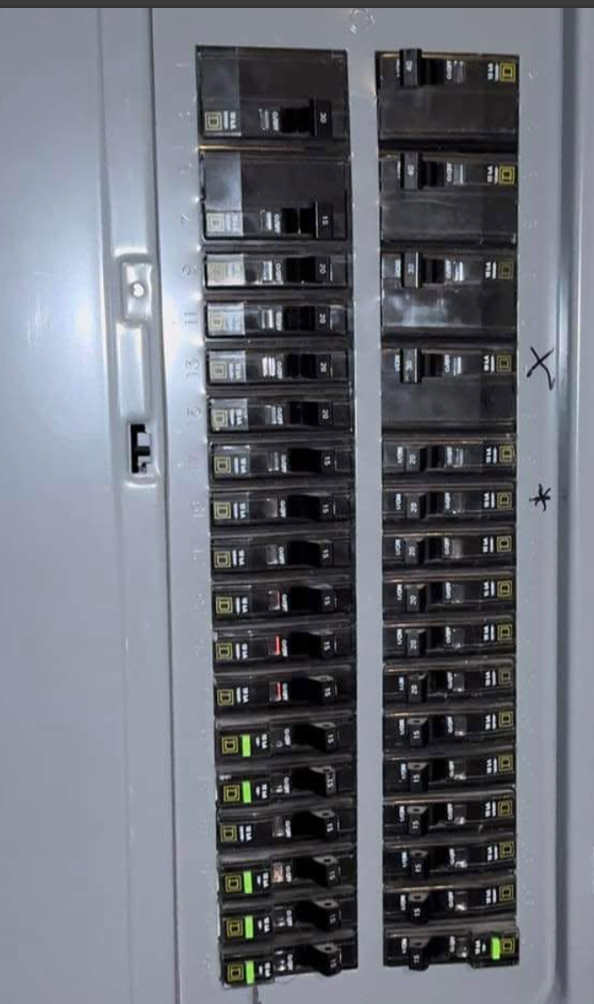 Residential outdoor main electrical breaker panel with the door open